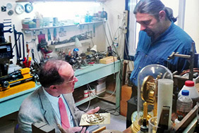 Michael T. Wright explaining the Antikythira mechanism to the greek antiquarian horologist, Europe