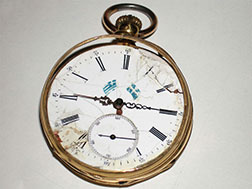 Repair of a pocket watch (before restoration)